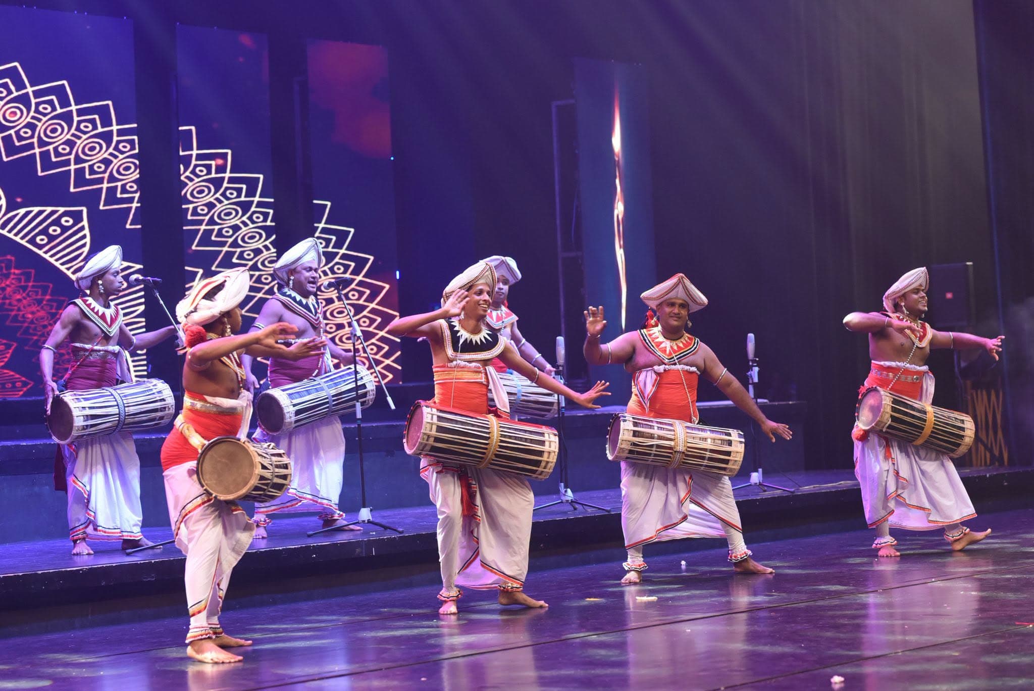 Traditional Sri Lankan drummers performing on stage